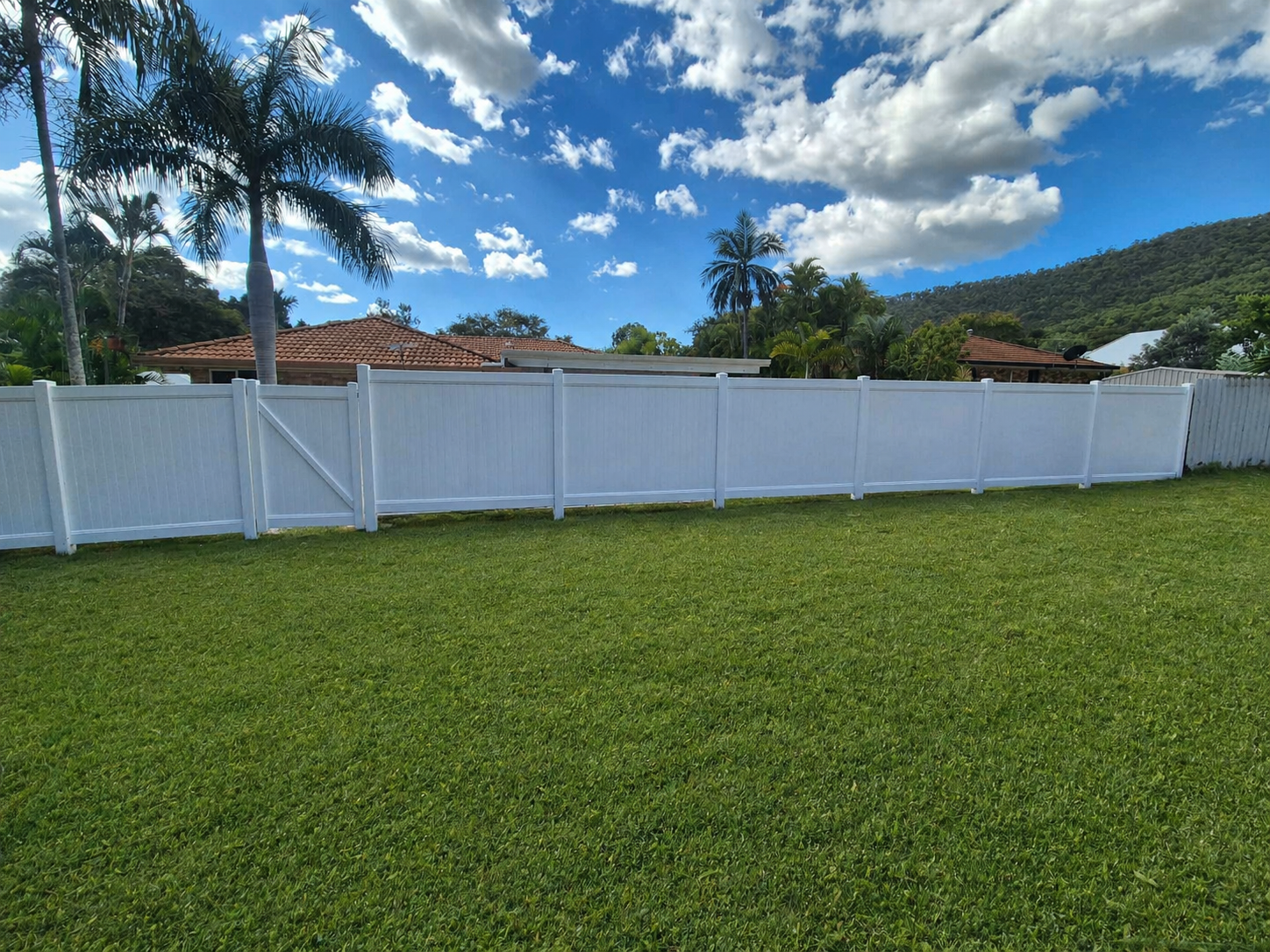1.8m full privacy white PVC fence installed in Queensland backyard